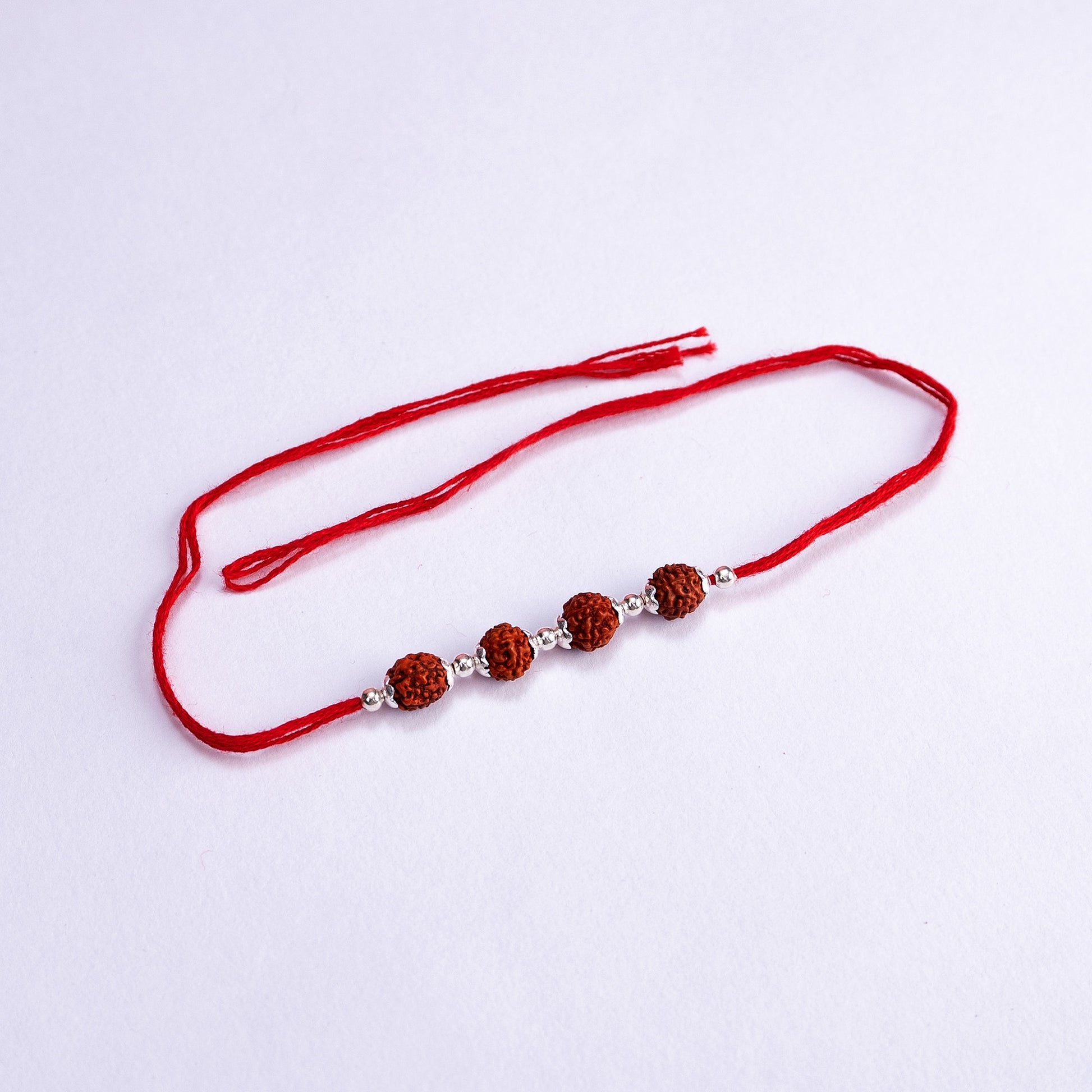 Four Bead Rudraksha Rakhi