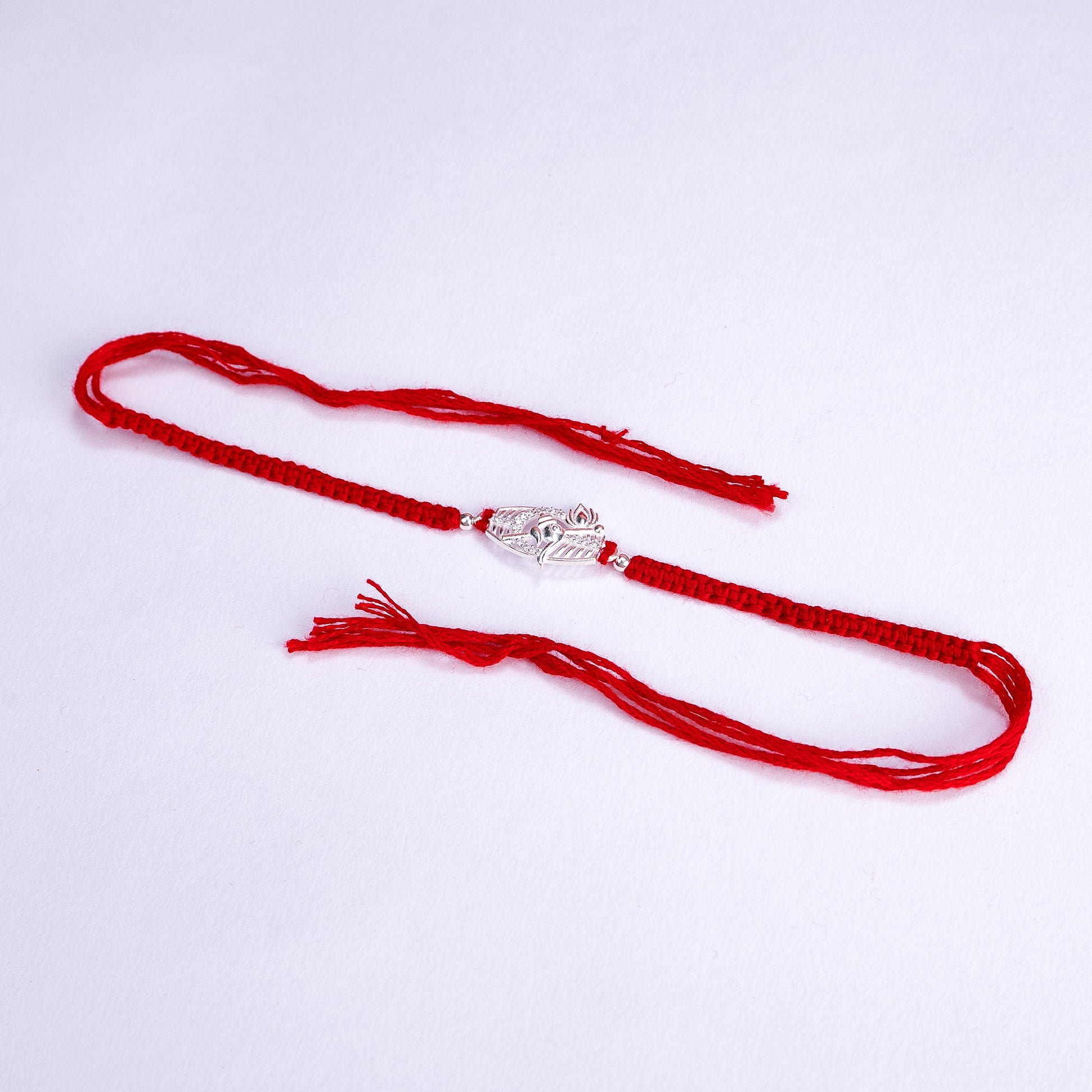 Ganesha Zircon Silver Rakhi
