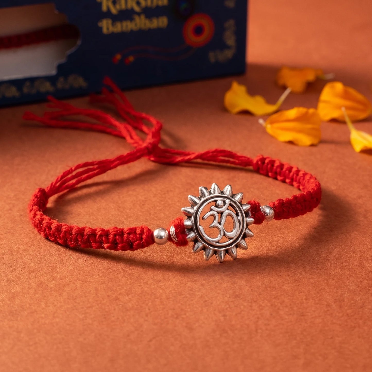 Om Sun Silver Red Thread Rakhi
