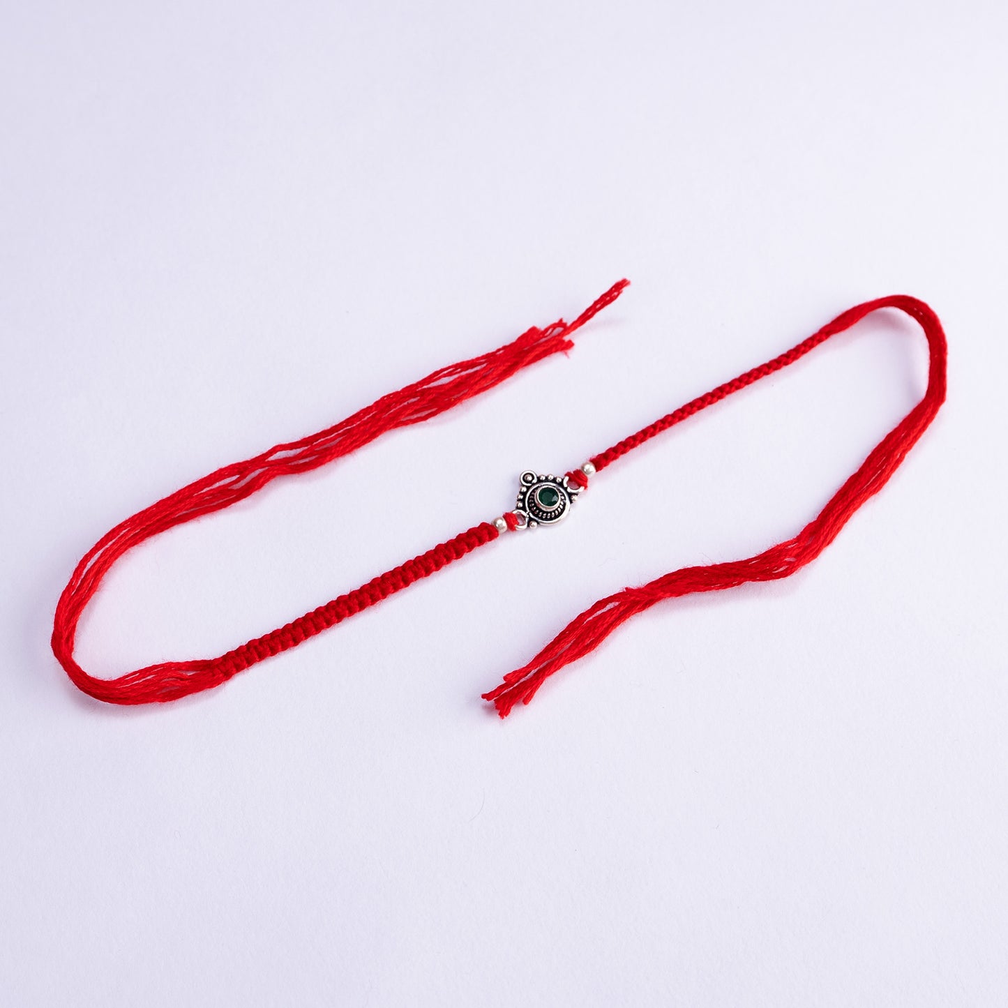 Oxidized Silver Green Stone Rakhi