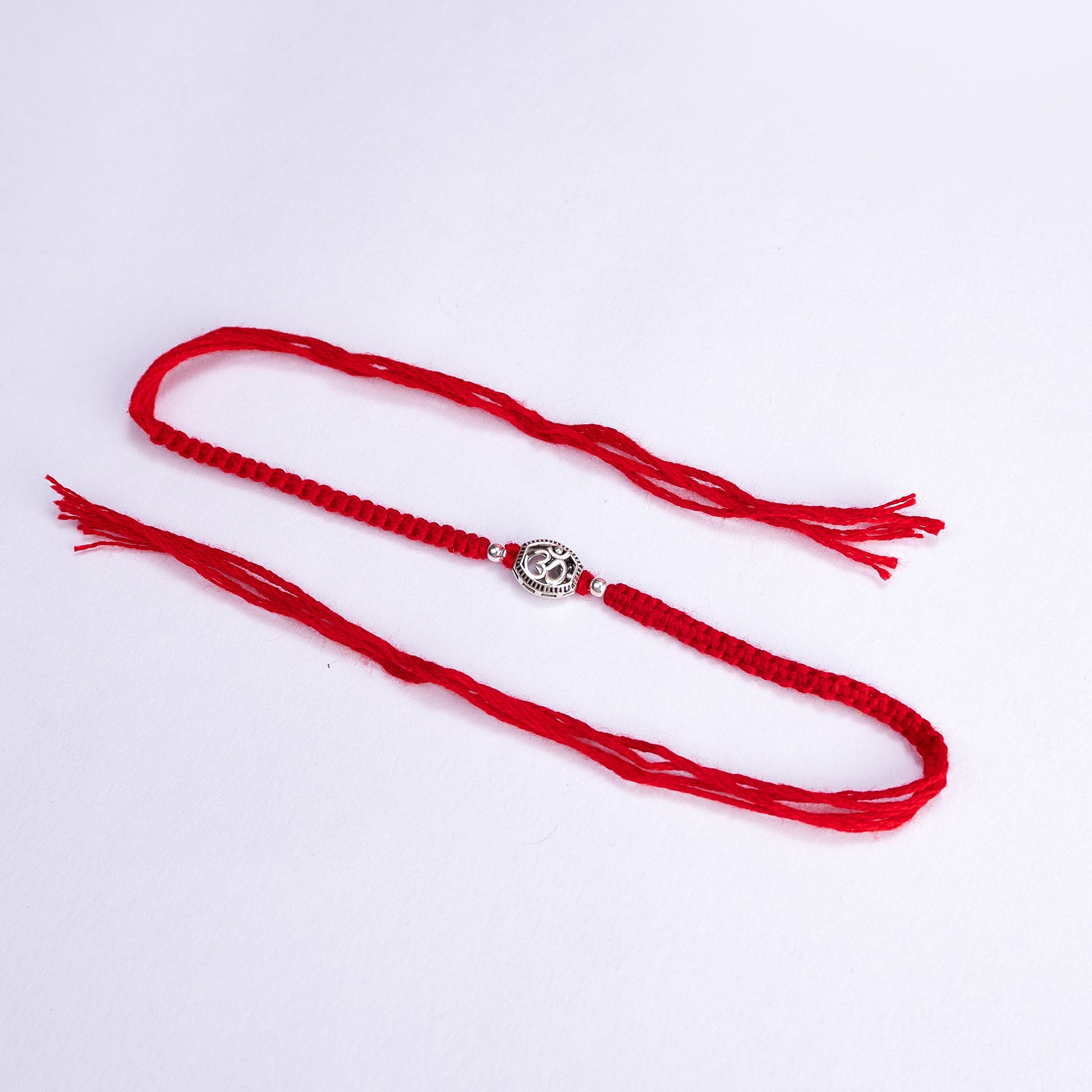 Silver Om Rakhi